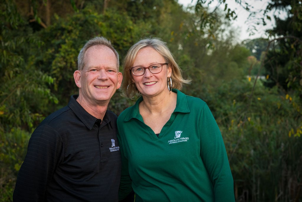 Petri Financial Services/Absolute Wages leadership team smiling outdoors Petri Financial Services/Absolute Wages leadership team smiling outdoors